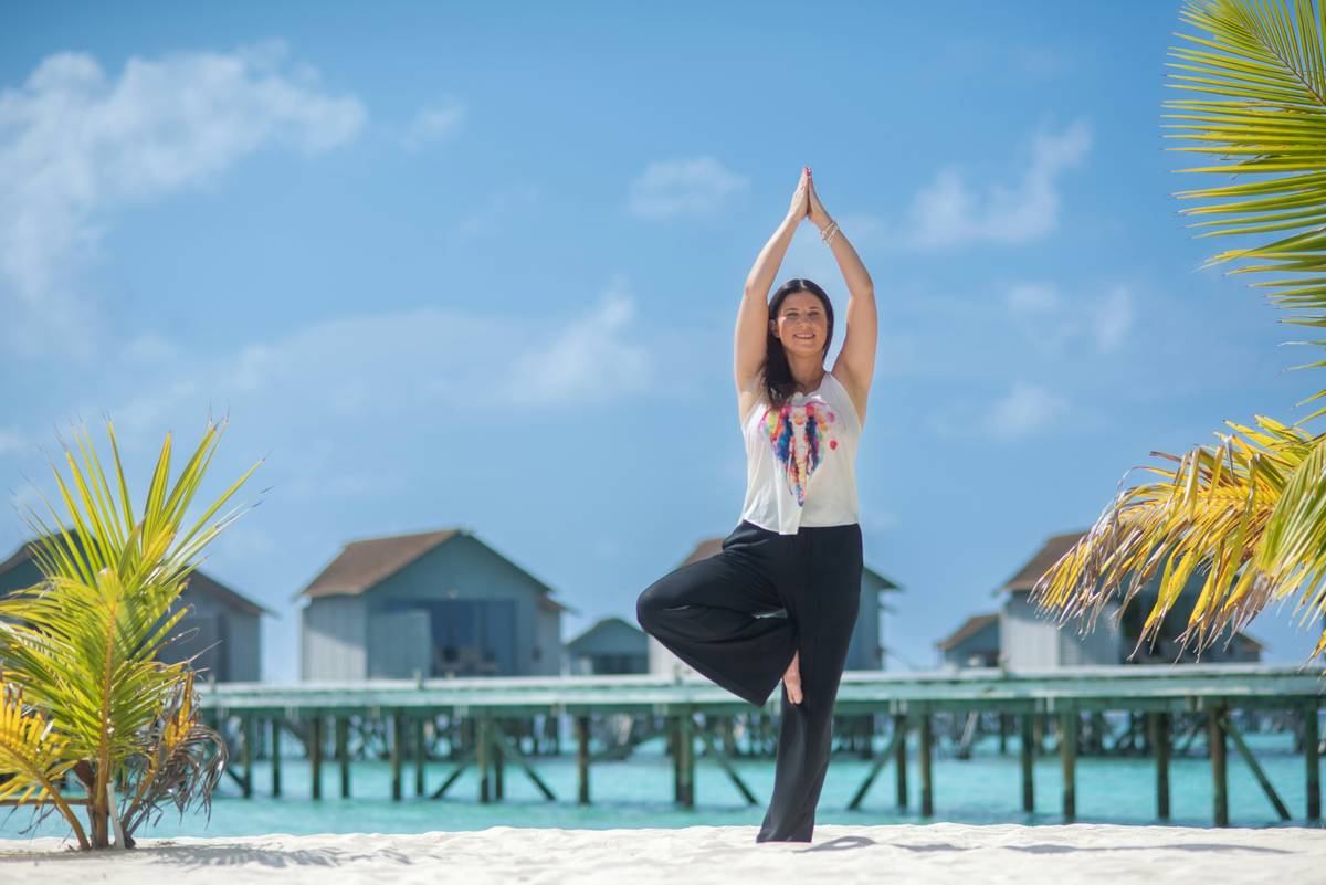Woman practicing breath pacing as examples of stress management techniques
